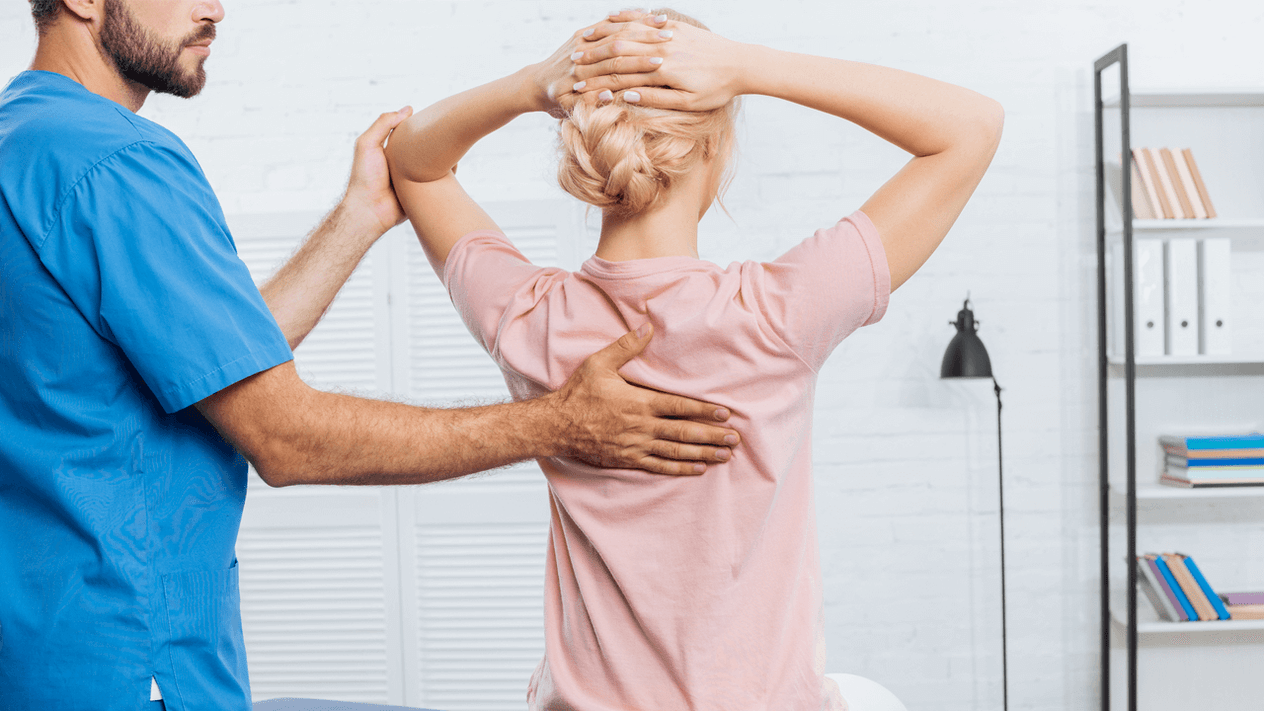 The girl turned to the doctor with a back pain complaint